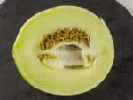 Melon blanc - Coupe longitudinale d'un fruit
